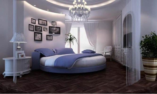 Cama preta moderna com detalhes elegantes e banco