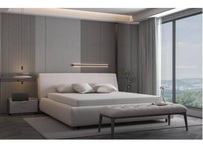 Cama elegante bege com travesseiro