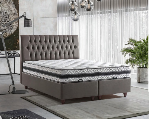 Cama com design suave e colchão cria uma atmosfera suave.