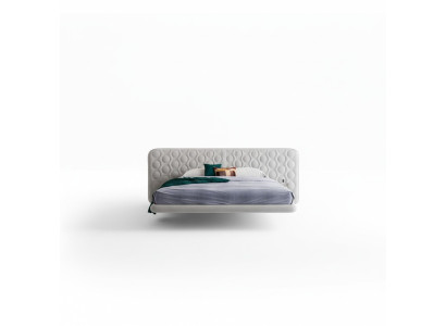 Cama branca moderna com design minimalista e arredondado