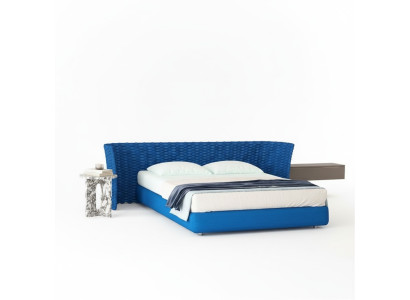 Cama de tecido azul com cabeceira estofada