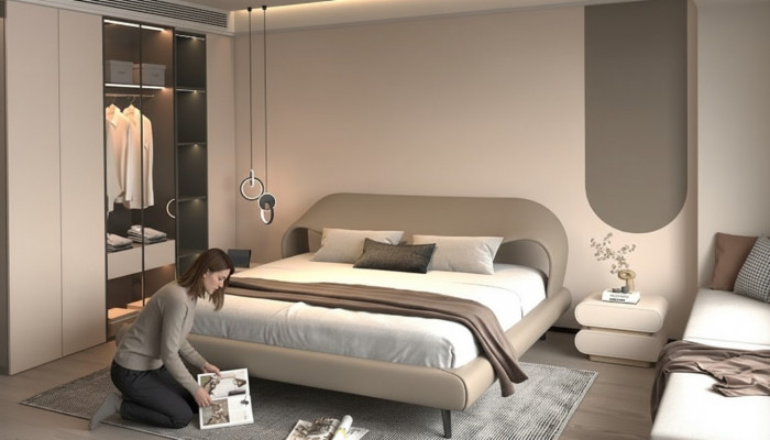 Cama cinza elegante com design minimalista e arredondado