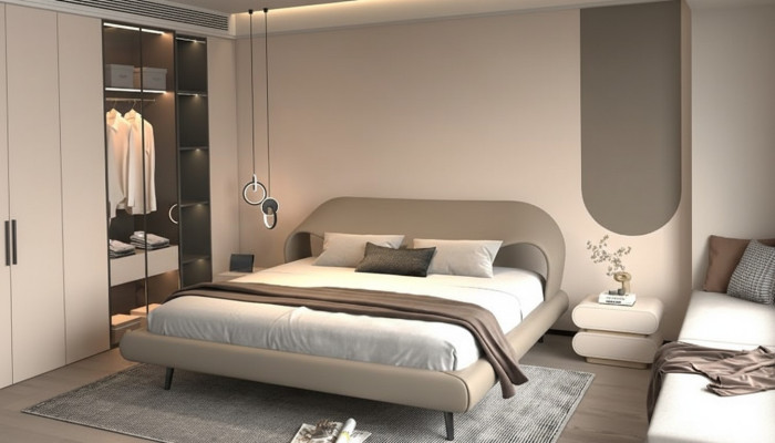 Cama cinza elegante com design minimalista e arredondado
