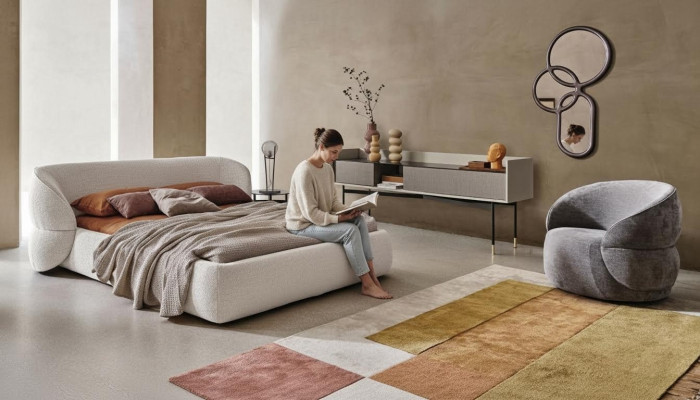 Banco moderno com função de cama em elegante tecido cinza